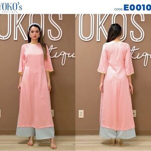 NEW Ao dai cach tan suong.
Vietnamese modern dress shifted.